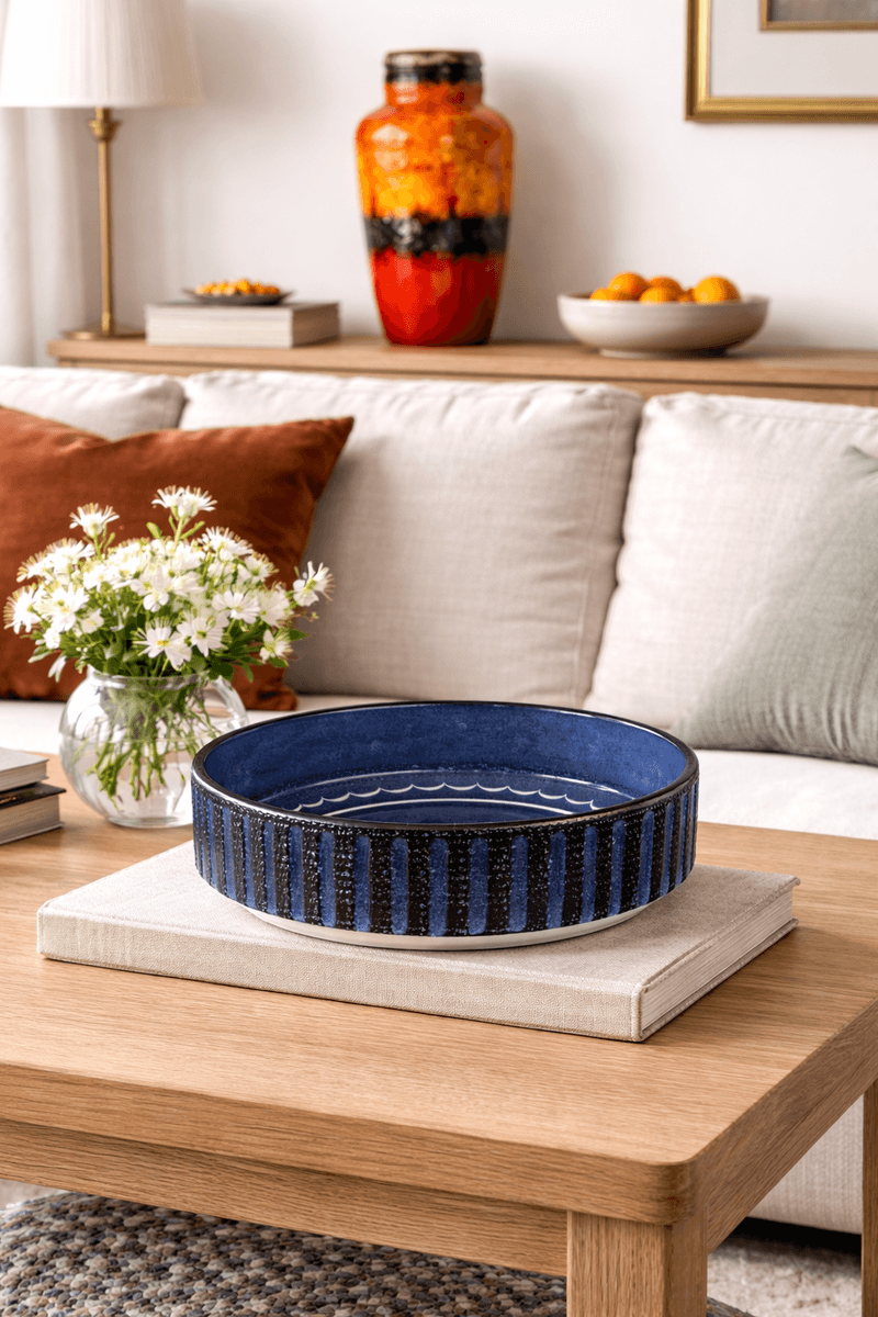 Graveren keramikk, blå bolle